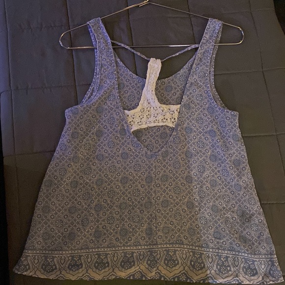 Flowy tank somewhat see through. - Picture 2 of 3